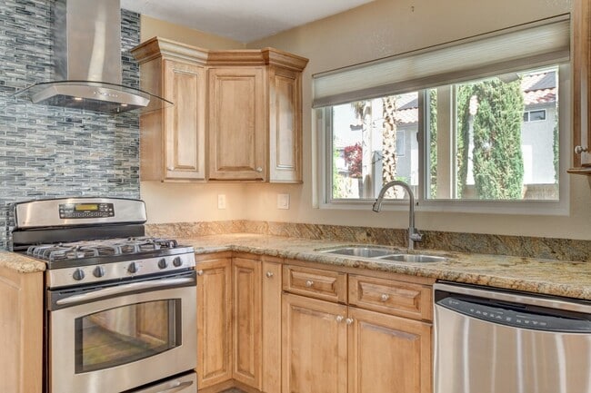 Building Photo - Gorgeous 4 Bedroom, 2 Story Home with a Beautiful Pool in the Lakes!