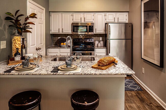 Building Photo - Your Next-Level Home Awaits – Specials Ava...