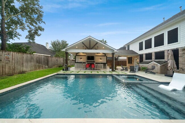 Building Photo - Executive Home with Sparkling Pool and Outdoor Entertainment Area
