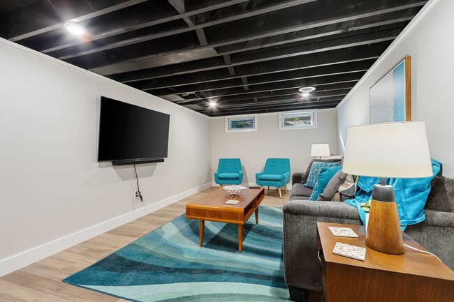 Building Photo - FURNISHED RENTAL: New Mid-Century Mod on M...