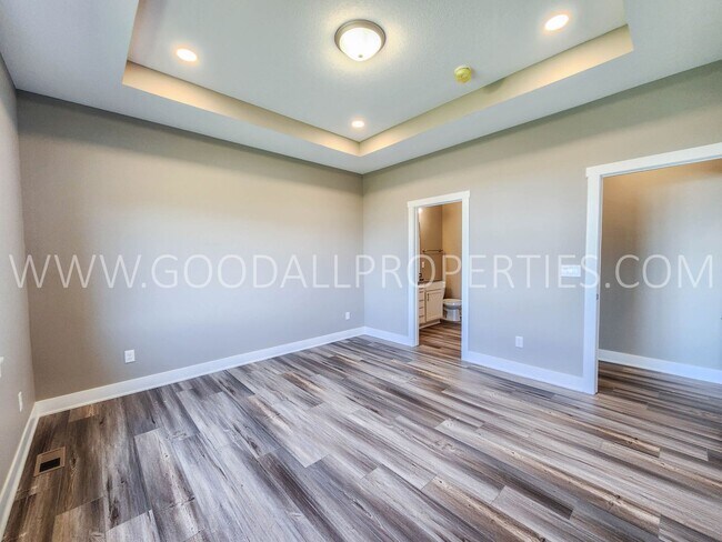 Building Photo - Spacious Waukee Ranch | 4 Bedrooms | 3-Car Garage | Finished Basement