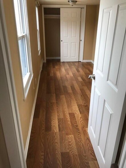 Smaller bedroom. - 25 W Main St