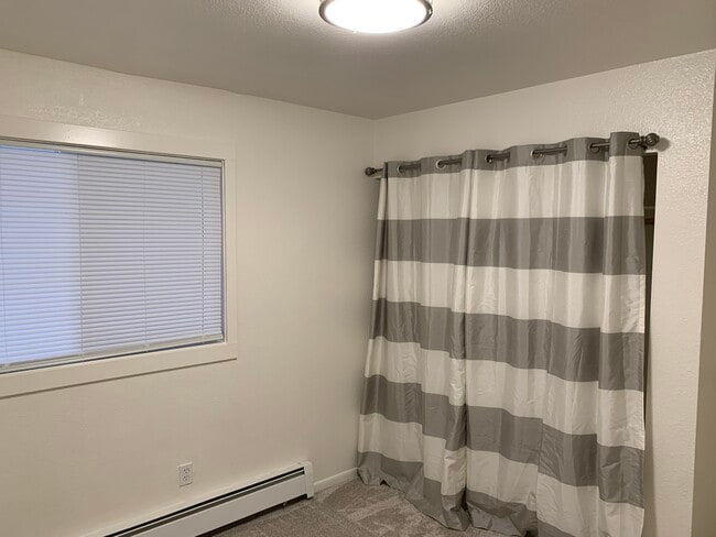 Building Photo - 2201 E 66th Ave