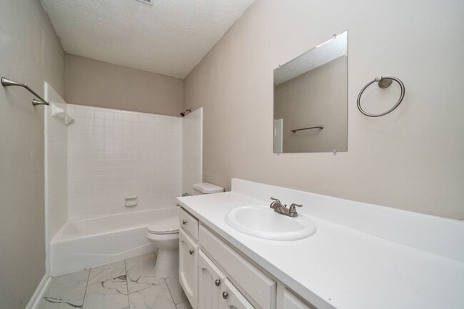 Building Photo - Now Leasing! 4-Bedroom Home with Modern Features & Great Layout