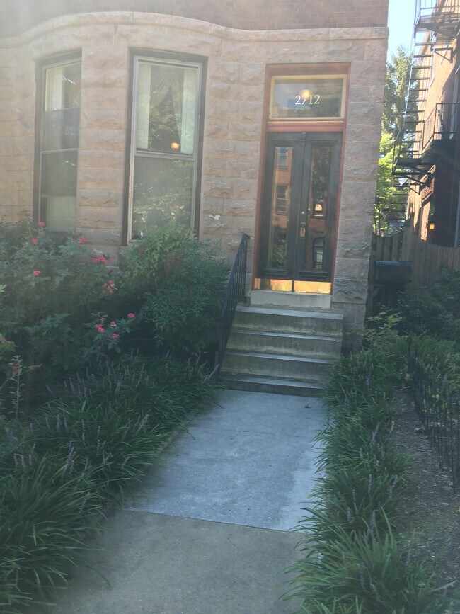 Front entrance to row home - 2712 Saint Paul St