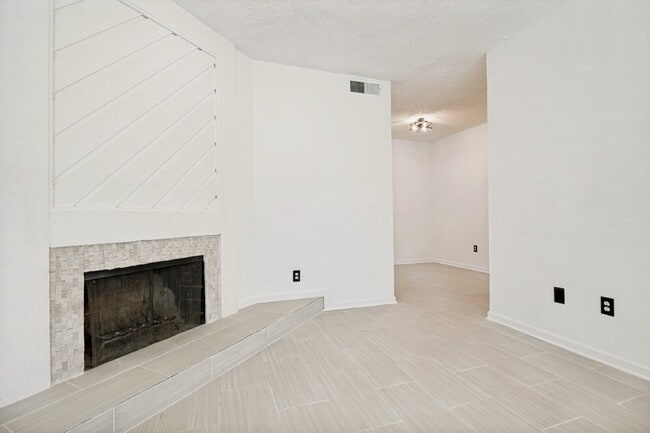 Building Photo - Spacious Dallas Condo with Unbeatable Storage, Private Patio & Carport