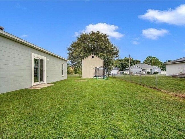 Building Photo - SINGLE FAMILY HOME IN POINCIANA 3/2