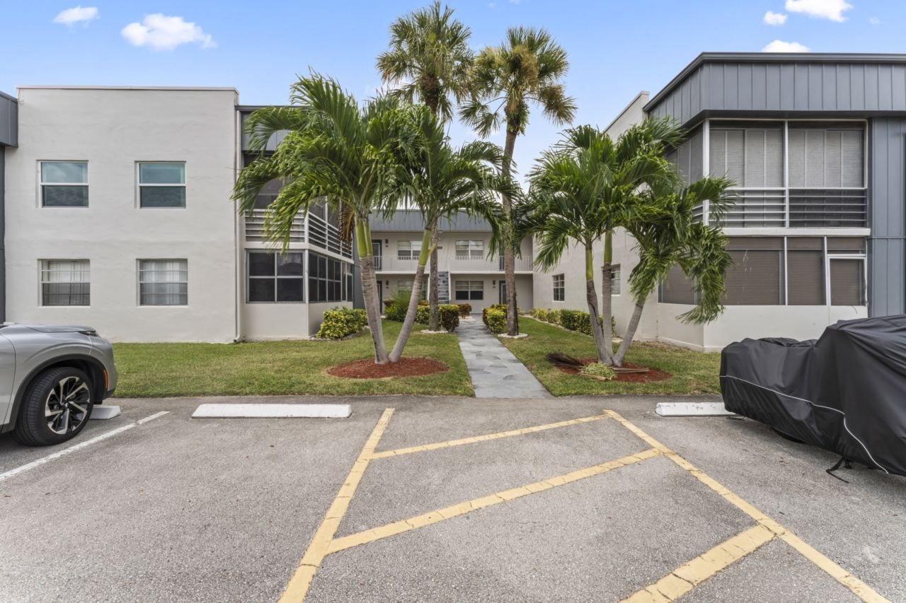 Parking in front of unit - 230 Normandy E