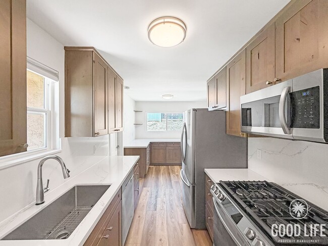 Building Photo - Modern 3B/2BA Home in Quiet Neighborhood with Private Yards and 2-Car Attached Garage