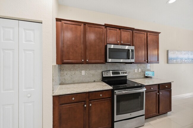 Building Photo - 10415 Wellington Parc Dr