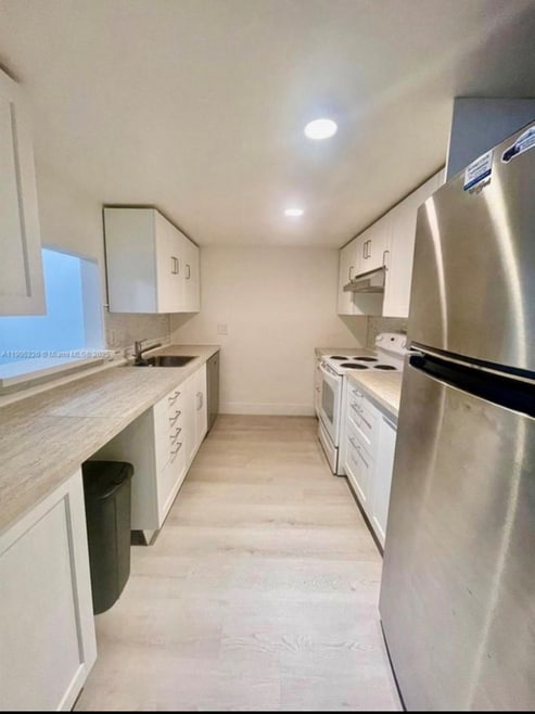 Building Photo - 4399 NW 9th Ave