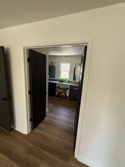 Entry into bathroom and walk in closet - 117 Battery Way
