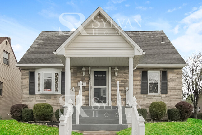 Building Photo - You will love this adorable brick home