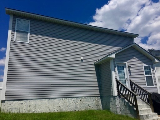 Building Photo - Two Story w/Fenced Back Yard just north of...