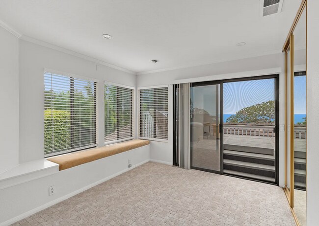 Building Photo - Unfurnished Village of Del Mar Home Boasti...