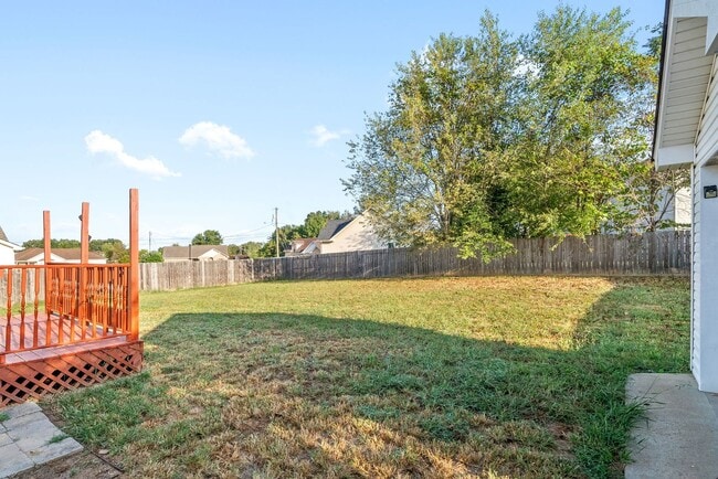 Building Photo - Adorable home with fenced back yard coming...