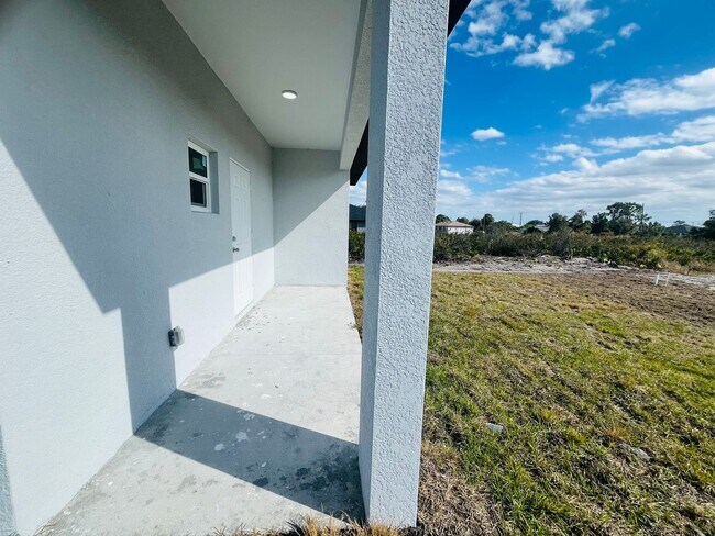 Building Photo - Brand-New 2BR/2BA Home with Lanai on Oversized Lot – Desirable SW Lehigh Acres