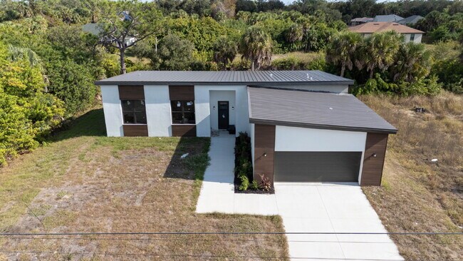Building Photo - Brand New Construction 3/2  Canal Front Home for Rent in North Port