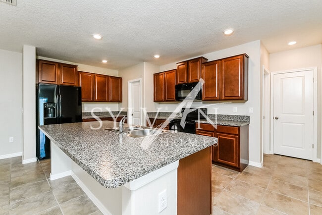 Building Photo - It’s time to start living the Real Life!