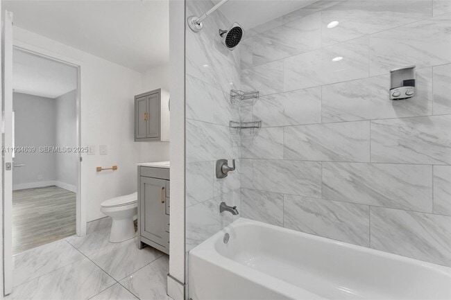 Building Photo - 1400 NE 57th Ct