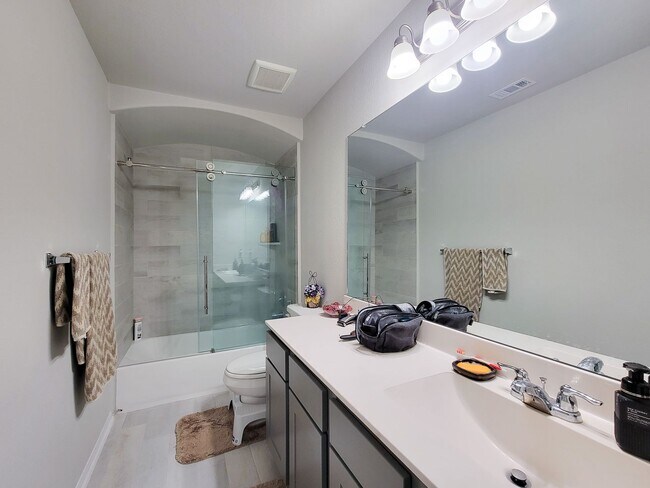 Building Photo - This stunning 2-year-old house with 4 beds, 3 baths, and an attached 2-car garage, it offers ampl...