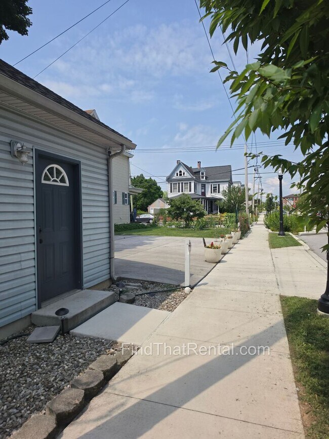Building Photo - Available August 16! A pet friendly ranch with dishwasher, garage, basement, storage, yard, deck