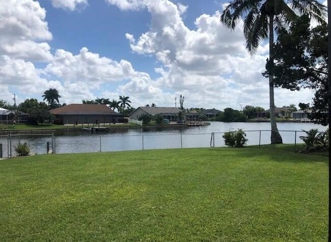 Enjoy the canal/basin view in the peaceful neighborhood. - 2321 SE 5th Ct