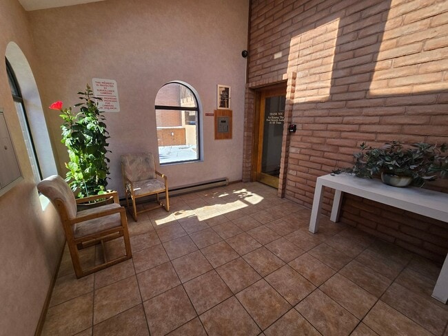 Building Photo - Secured Building with covered parking!