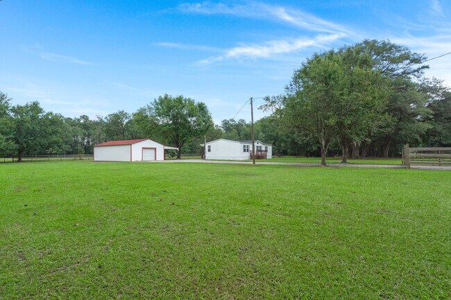 Building Photo - beautifully refreshed 3-bedroom, 2-bath home offering peaceful country living with modern updates!