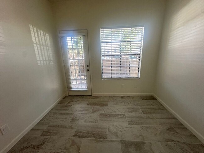Building Photo - ELLIOT PLACE CONDOMINIUMS UPDATED/REMODELED GROUND FLOOR 1 BED PLUS DEN UNIT WITH 1 CAR GARAGE
