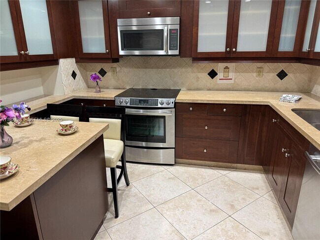 Building Photo - 9801 Collins Ave