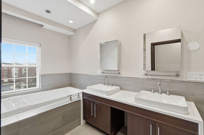 Building Photo - This exceptional West Market location is just steps from Reston Town Center, offering convenient ...