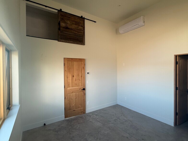 Bedroom with storage access - 1905 Bear Ridge Rd