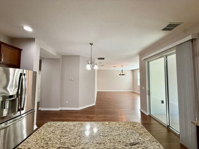 Building Photo - SPACIOUS Two Story Beautiful 5/4 Home in The Enclave At Aloma!