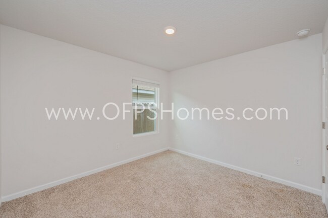 Building Photo - 4/2 in Pace Community!! AVAILABLE SEPTEMBER 2026!