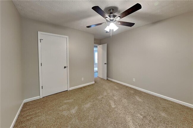 Building Photo - 5580 Dorsett Shoals Ln