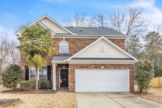 Building Photo - Spacious 4BR Home w/ Screened Porch, Fenced Yard & Great Location