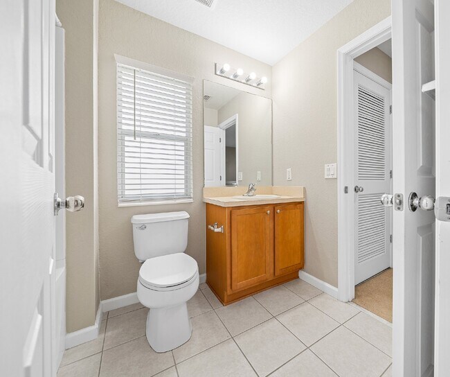 Building Photo - Corner Unit ~ Lake View ~ Maintenance Free...