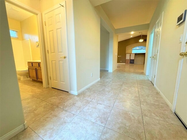 Building Photo - Vaulted Ceiling single-story home in a gat...