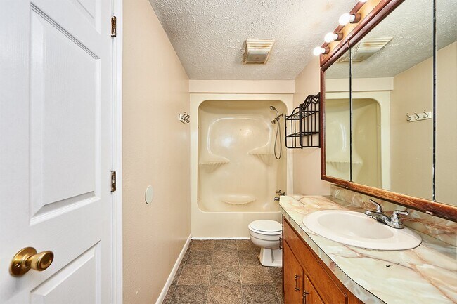 Building Photo - Coming Soon: 2 BR unit that includes water, trash, and yard care.