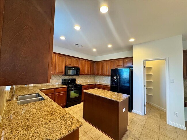 Building Photo - 3640 Fossilwood Way