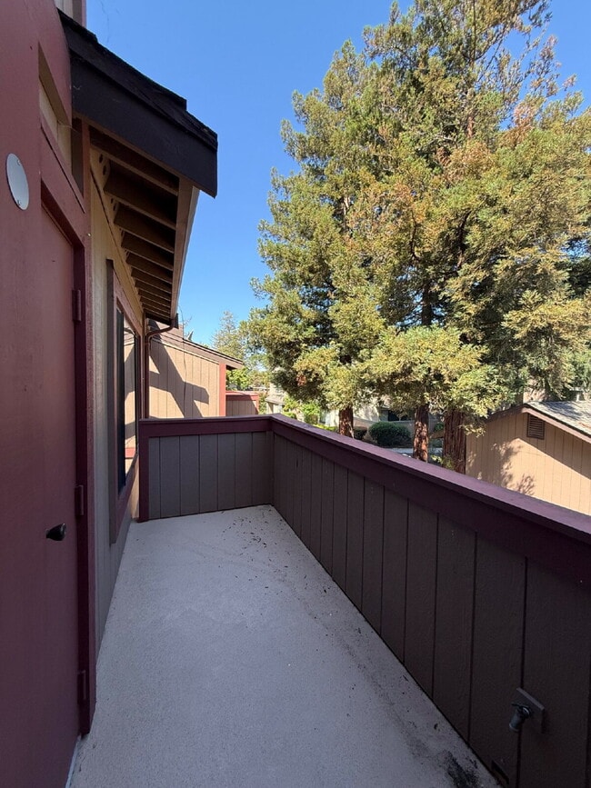 Building Photo - Spacious 3-Bedroom, 2-Bath Multi-Level Home with Balcony, In-Unit Laundry & Dual Parking