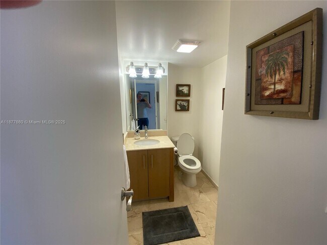 Building Photo - 10275 Collins Ave