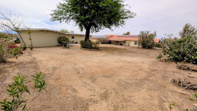 Building Photo - Darling Bungalow with New Flooring!