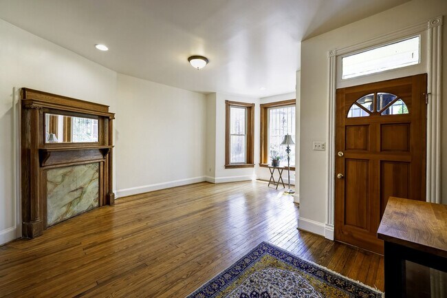 Building Photo - Historic & Charming 3BR Rowhouse near Howard is Move-in Ready!