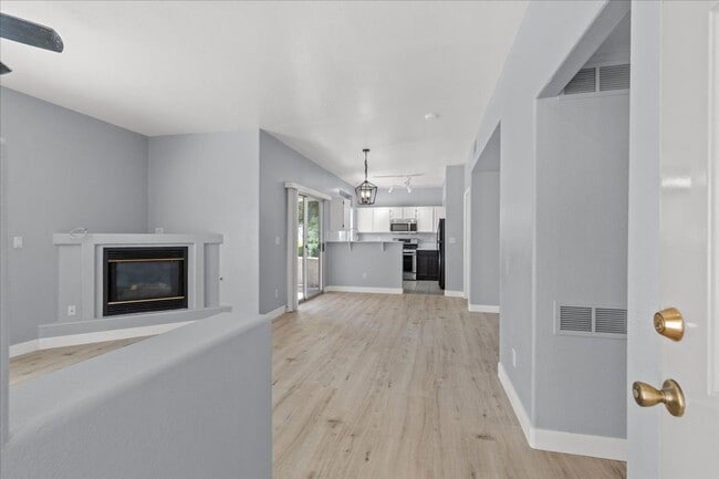Building Photo - Sleek 2 Bedroom Condo with 2 Car Garage Ne...