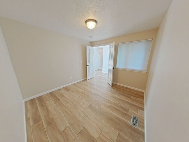 Building Photo - 4 bedroom on a large corner lot