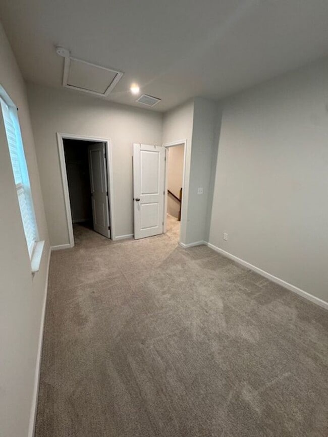 Building Photo - 4BR 3.5BA Townhome w/ 2-Car Garage • Quartz-Island Kitchen • Balcony in Matthews