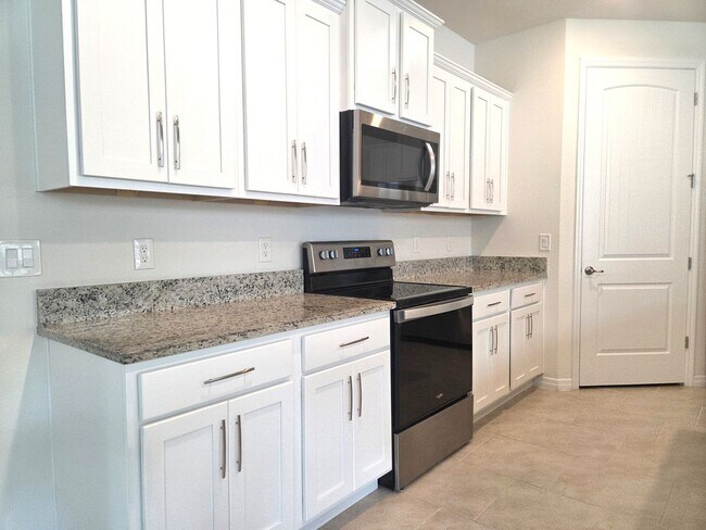 Building Photo - 55+ Gated Community at Palms at Serenoa