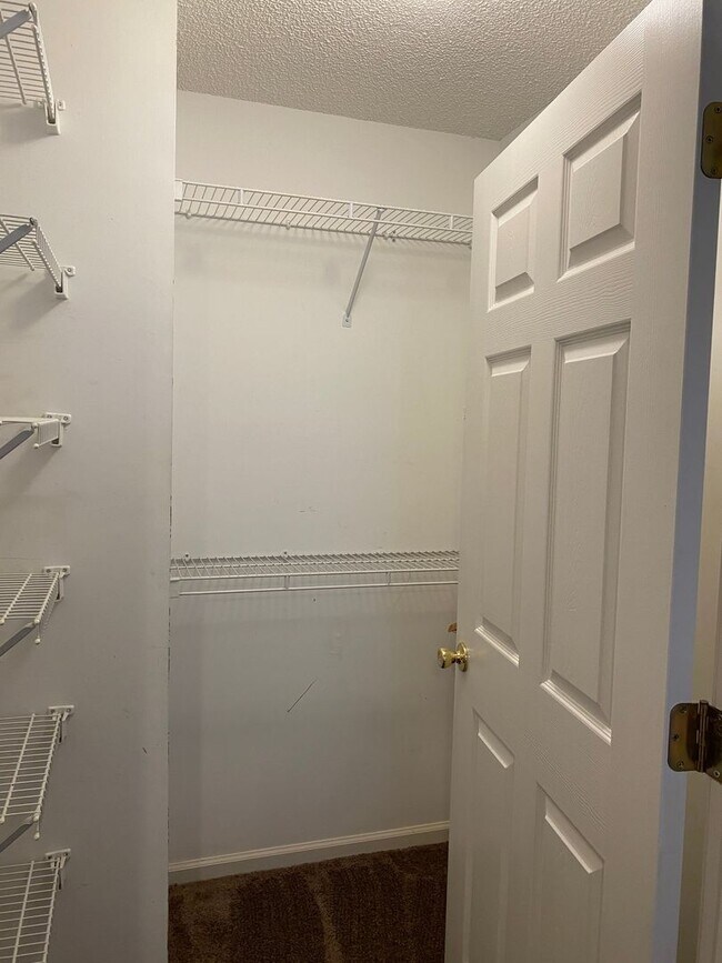 Building Photo - Furnished! Breezewood ground floor unit, Open floor plan, fire place, patio, large closets, wood ...